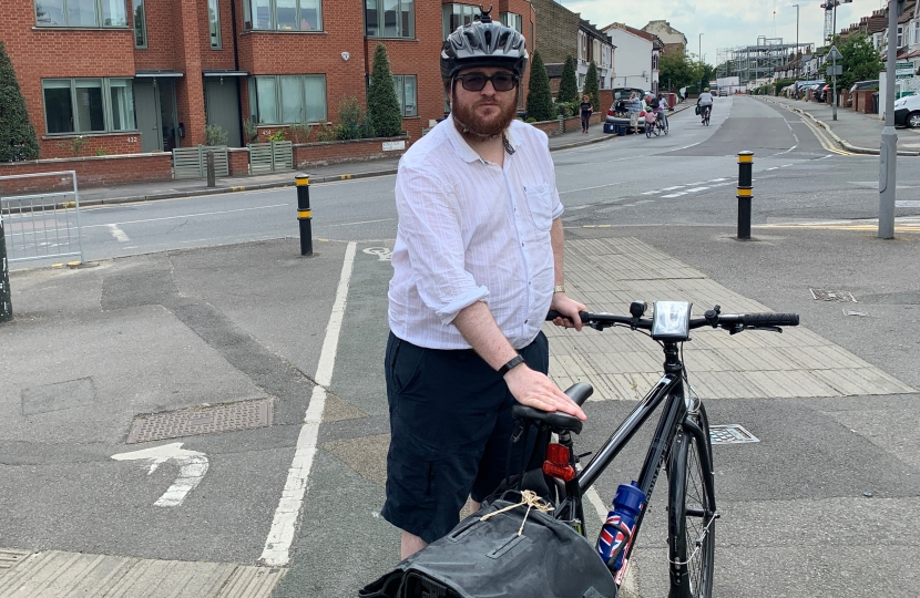 Cllr Daniel Holden out cycling.