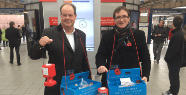 Conservative poppy sellers at Wimbledon station (left to right: Stephen Hammond MP and Cllr Daniel Holden.