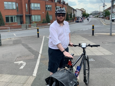 Cllr Daniel Holden out cycling.